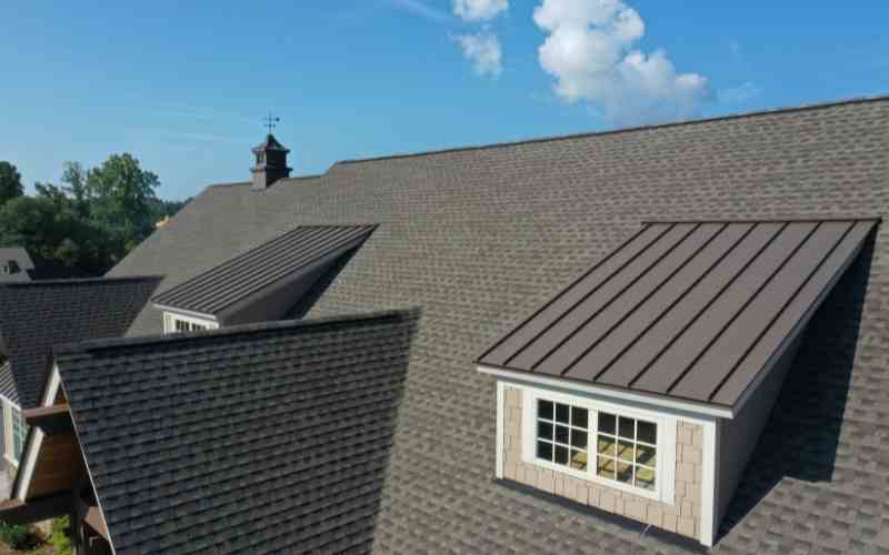 Metal Roof Tied Into Shingles